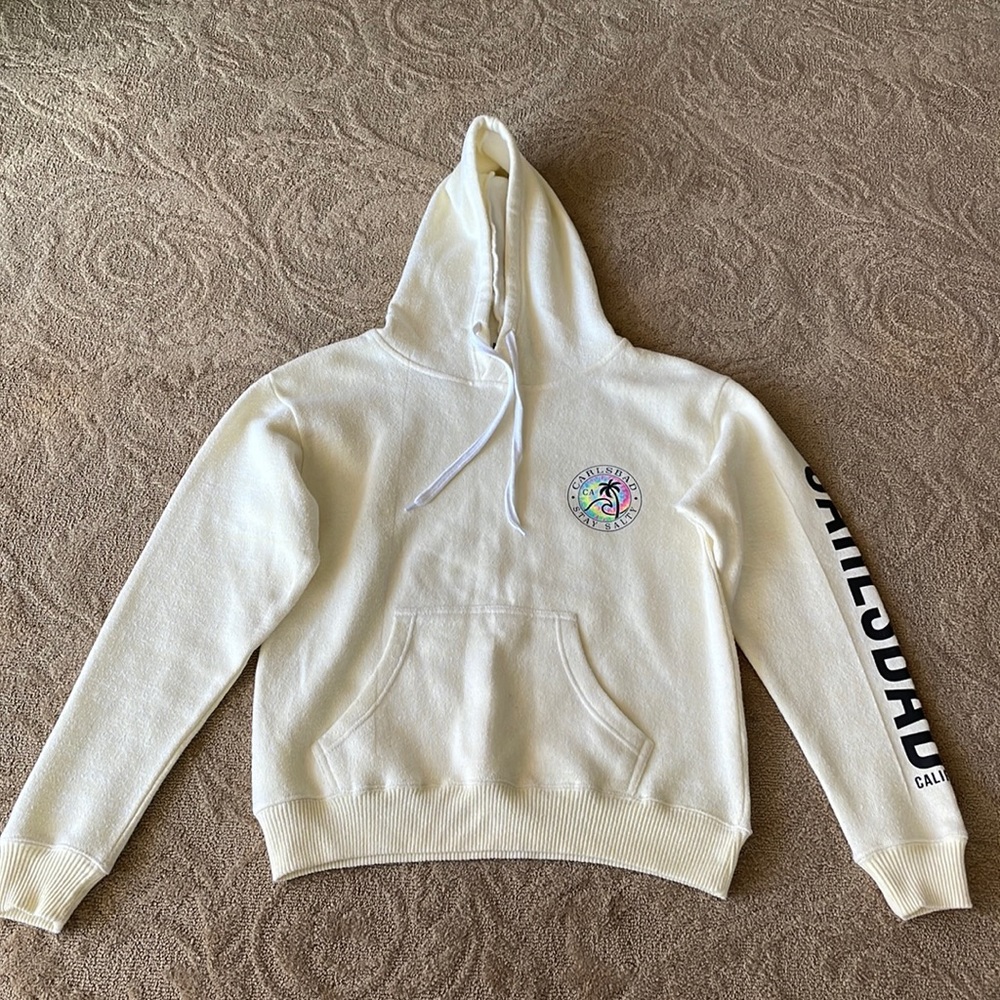 Carlsbad California stay salty, yellow hooded sweatshirt labeled a size small.